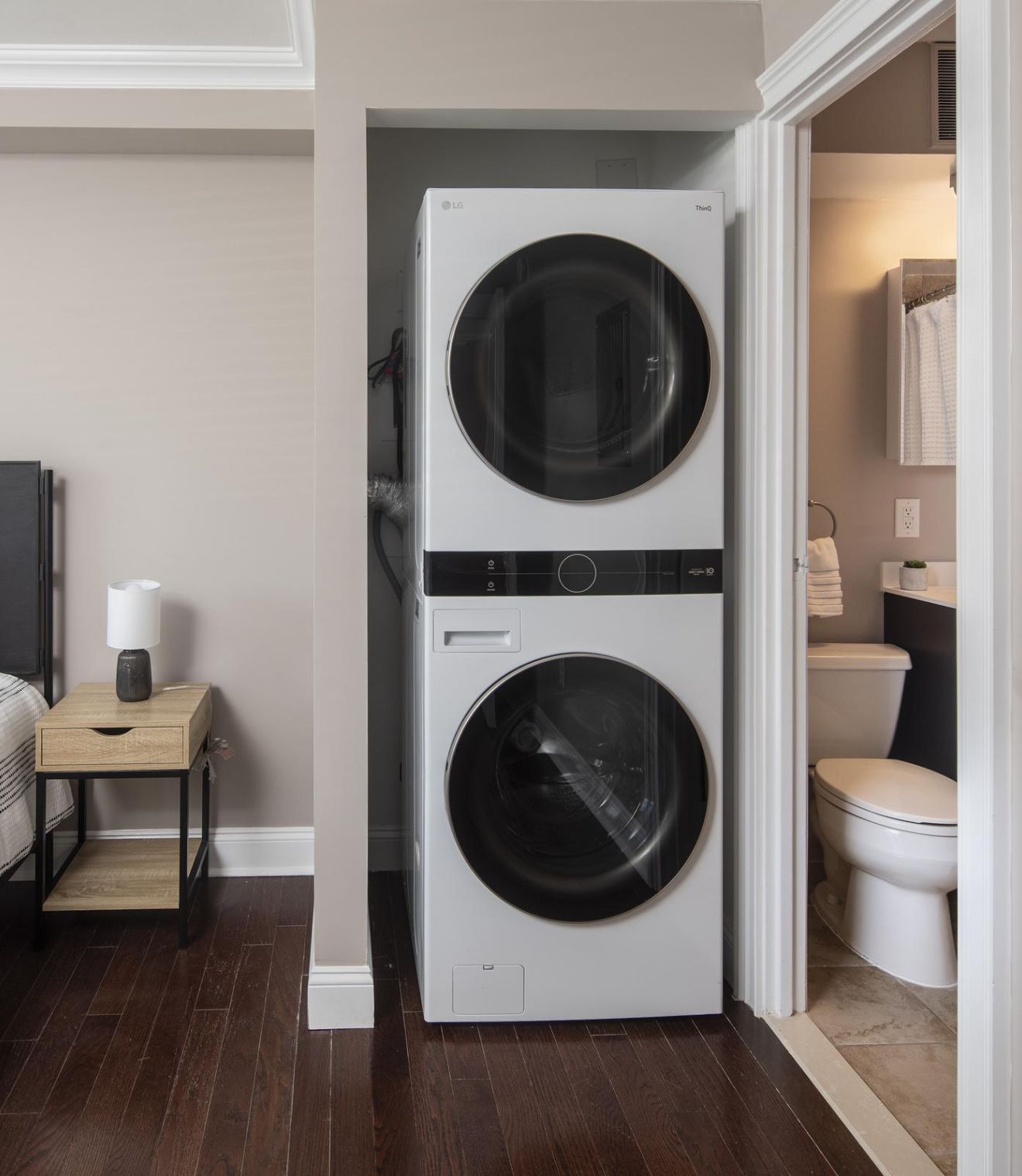 Uptown 550 Midrise spacious kitchen with custom cabinetry and stainless steel appliances