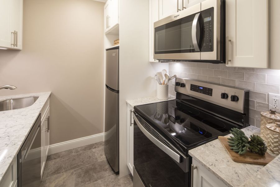 Cadillac Manor Modern Minimal Bathroom with Tub and Sink