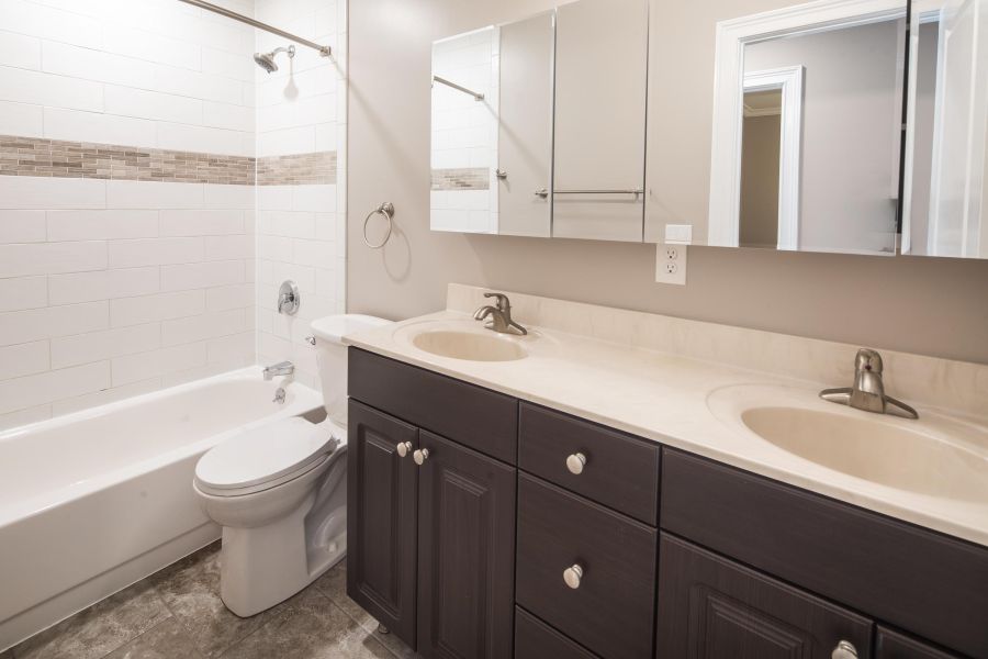 Cambridge Manor Modern Minimal Bathroom with Tub and Sink