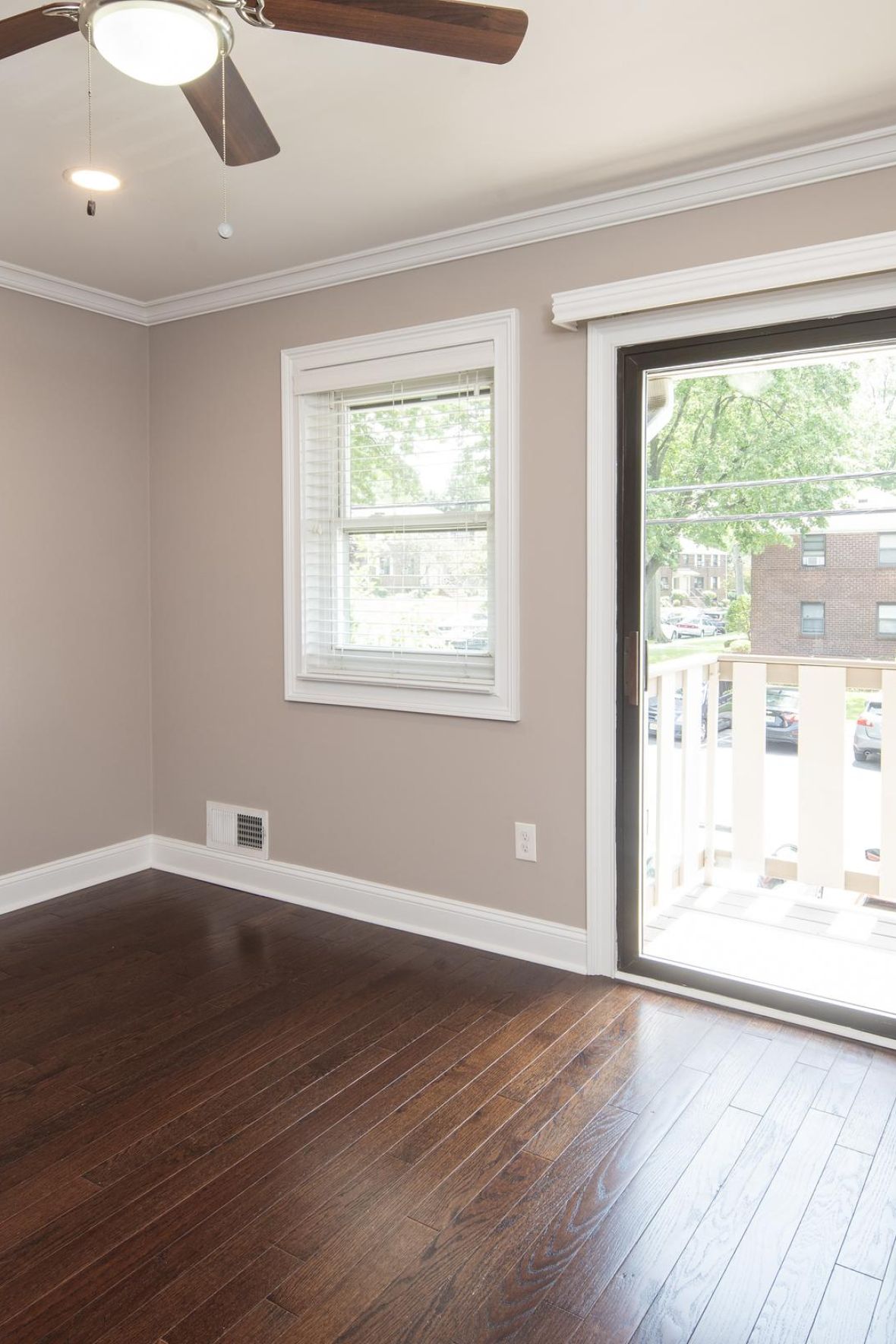 Cambridge Manor Modern Minimal Apartment Kitchen with butcher block counters and industrial light fixtures