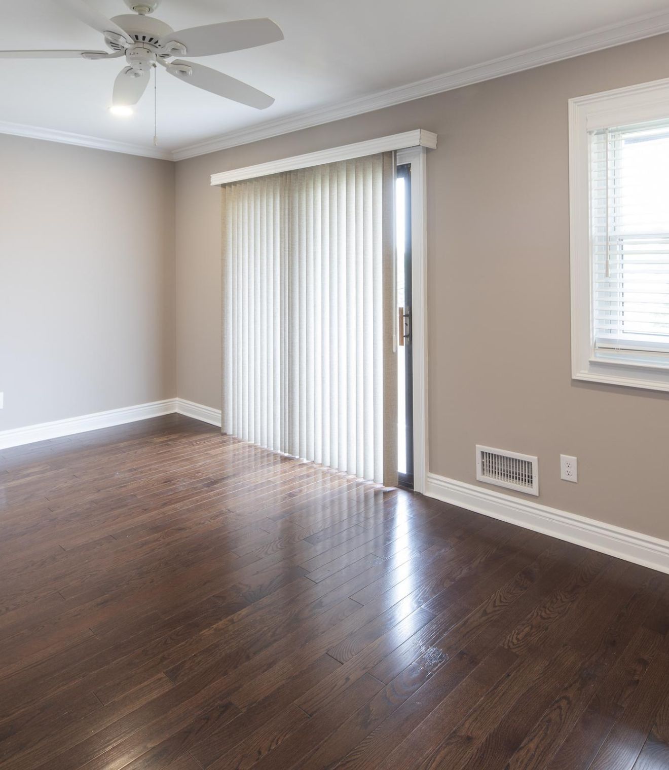 Uptown 550 Midrise spacious kitchen with custom cabinetry and stainless steel appliances