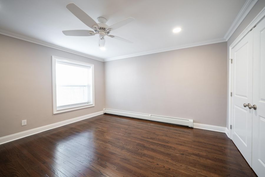 Hickory Manor Modern Spacious Living Room with mid-century furnishings and floor-to-ceiling windows