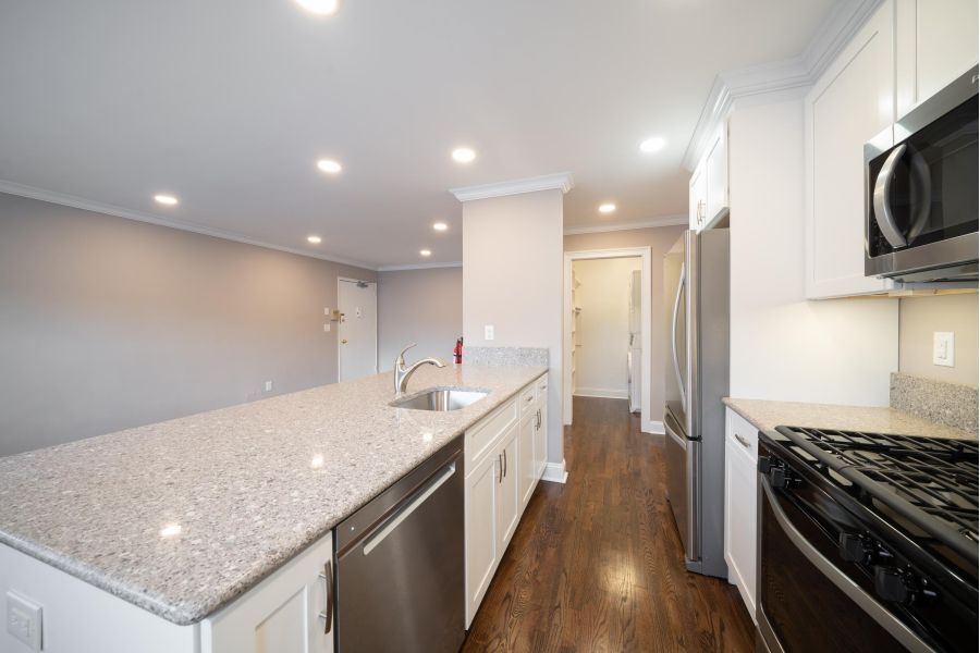 Hickory Manor Modern Minimal Bathroom with Tub and Sink