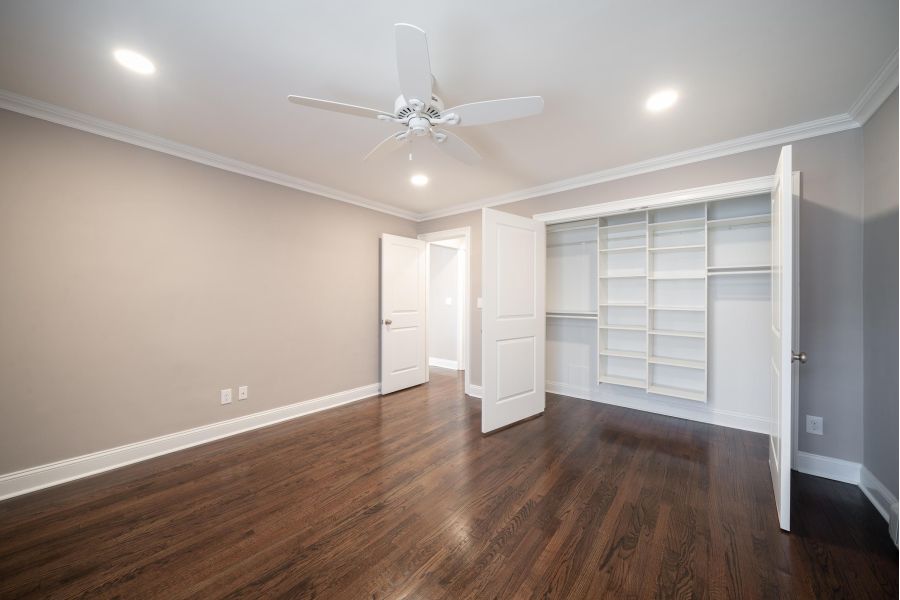 Hickory Manor Modern Spacious Living Room with mid-century furnishings and floor-to-ceiling windows
