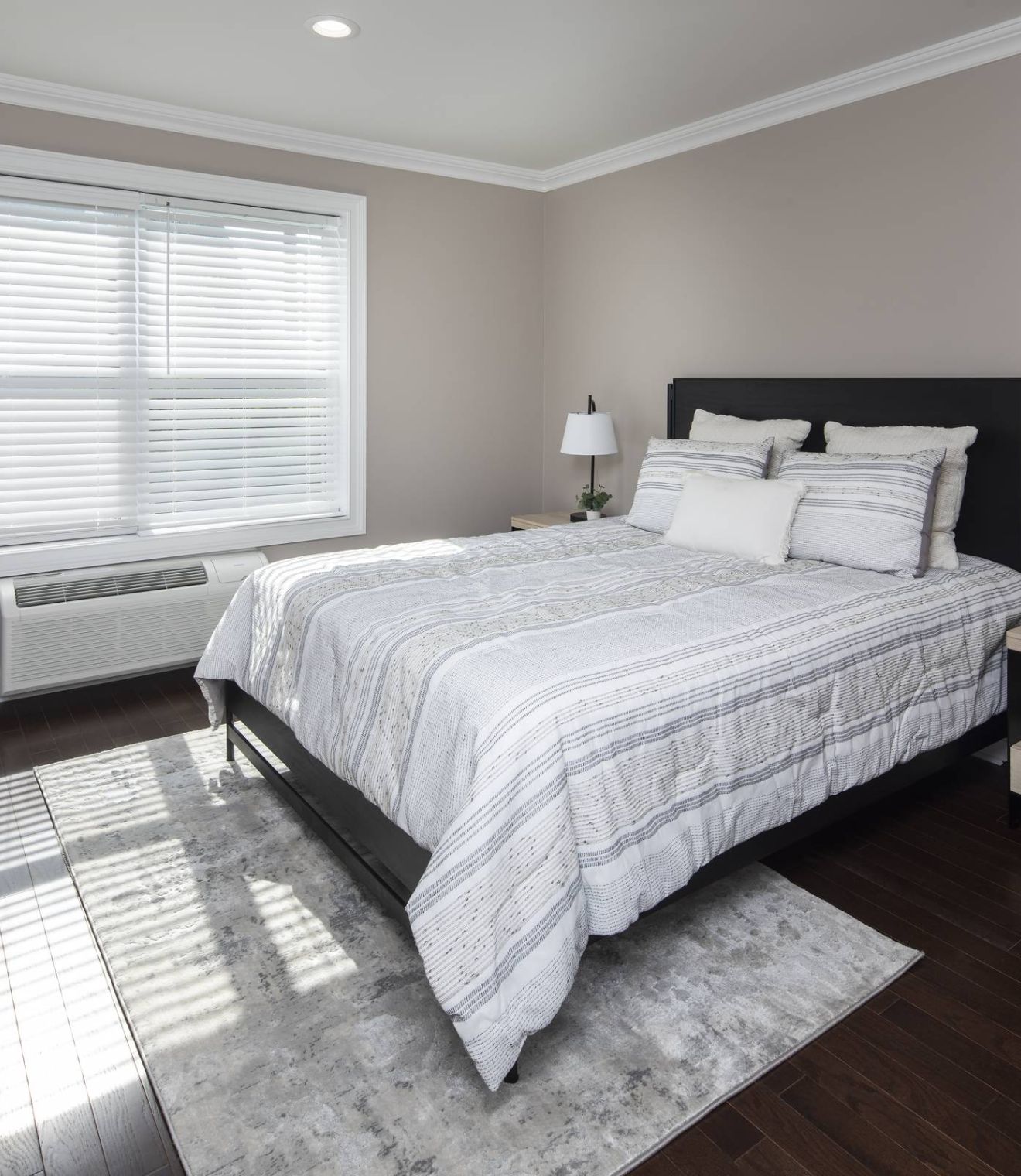 Uptown 550 Midrise spacious kitchen with custom cabinetry and stainless steel appliances