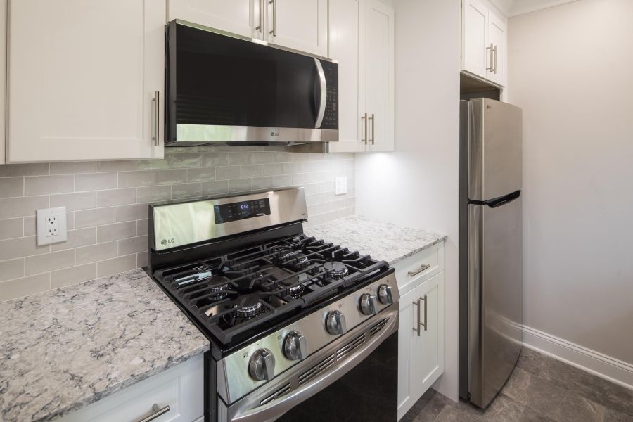Leonia ManorPrimary Bedroom with Patio Windows