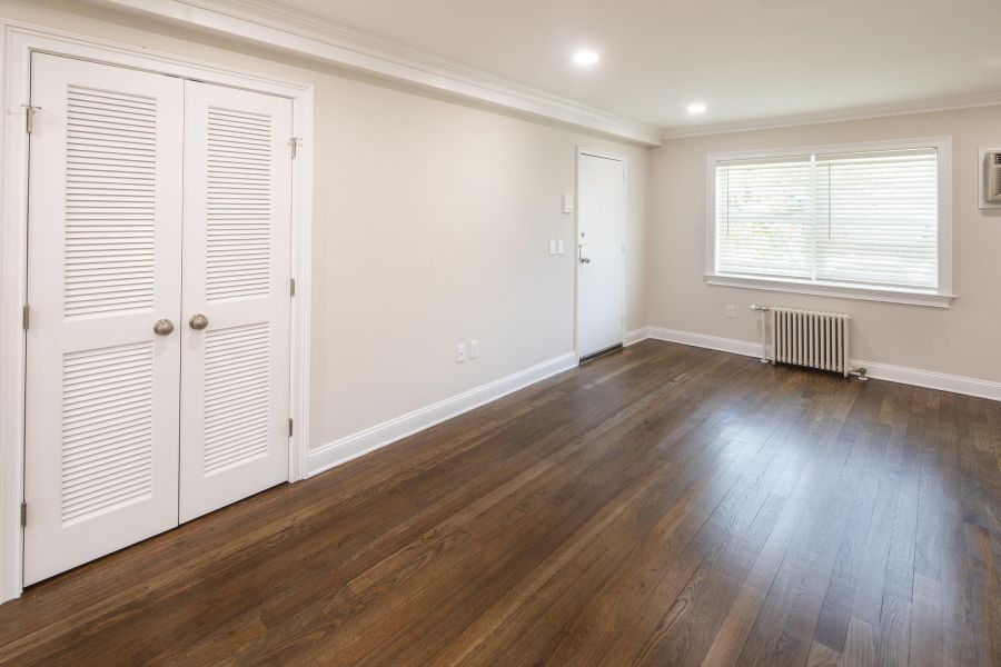 Leonia Manor Modern Spacious Living Room with mid-century furnishings and floor-to-ceiling windows