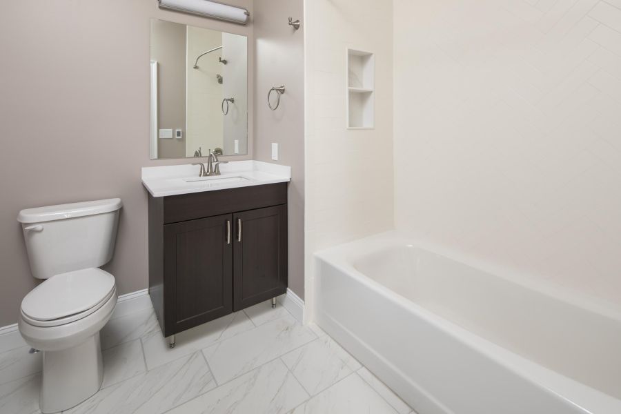 North Washington Square at Hickory Modern Spacious Living Room with mid-century furnishings and floor-to-ceiling windows