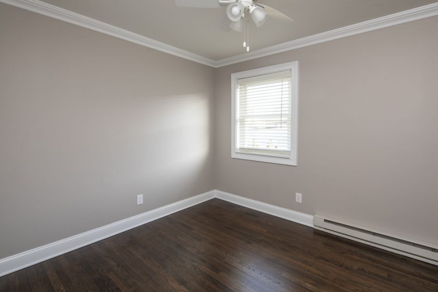 Regency Manor Modern Minimal Bathroom with Tub and Sink