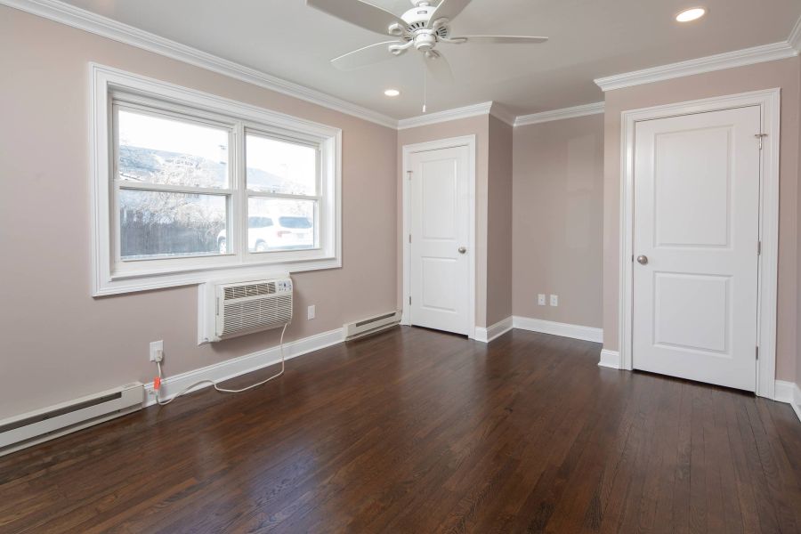 Regency ManorPrimary Bedroom with Patio Windows