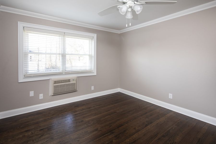 Regency ManorPrimary Bedroom with Patio Windows