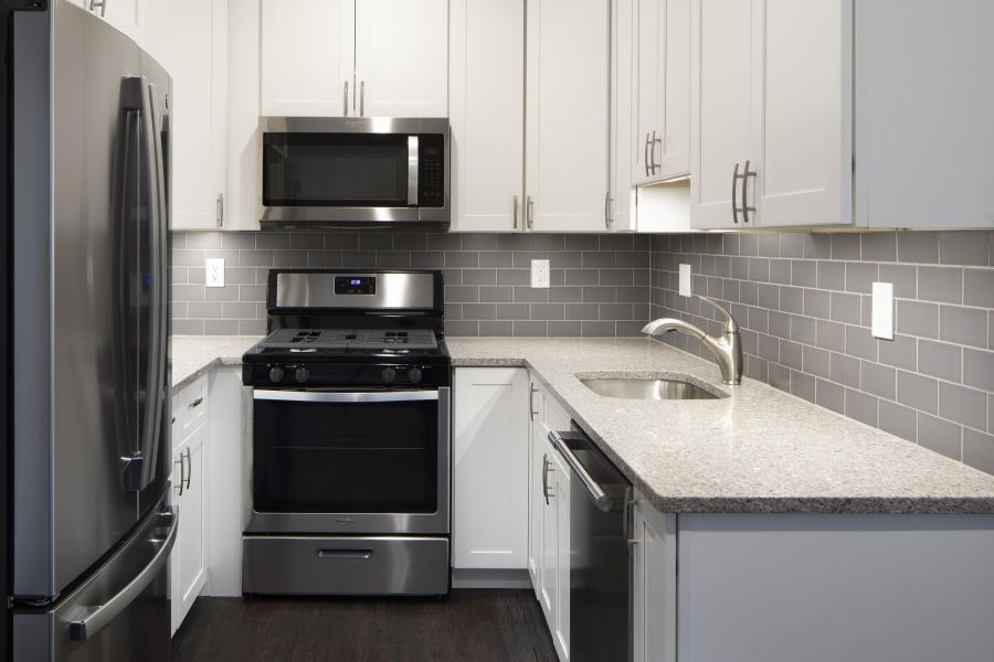 The Cornerstone Modern Minimal Bathroom with Tub and Sink