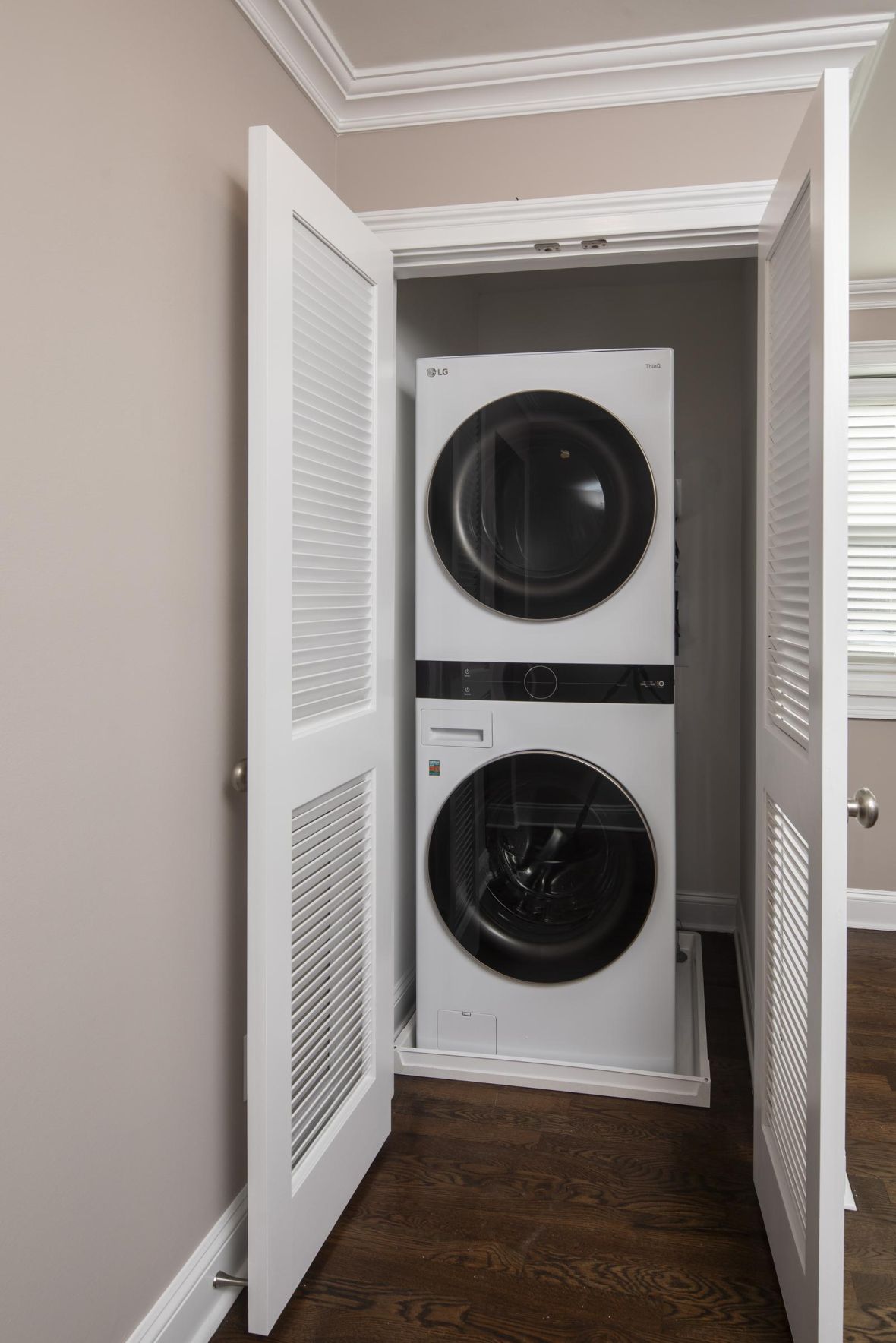 Villa Malta Modern Minimal Apartment Kitchen with butcher block counters and industrial light fixtures