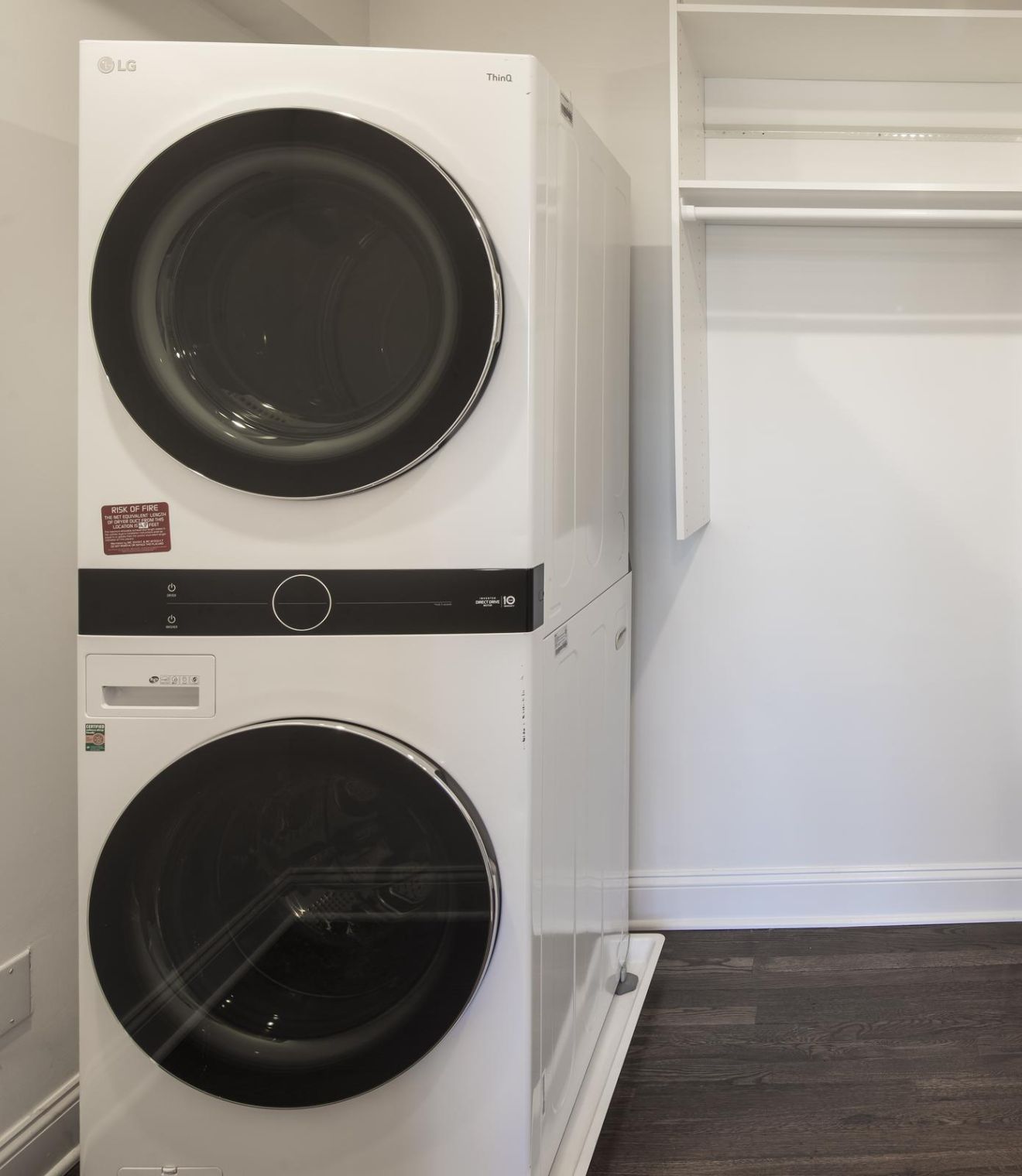 Uptown 550 Midrise spacious kitchen with custom cabinetry and stainless steel appliances