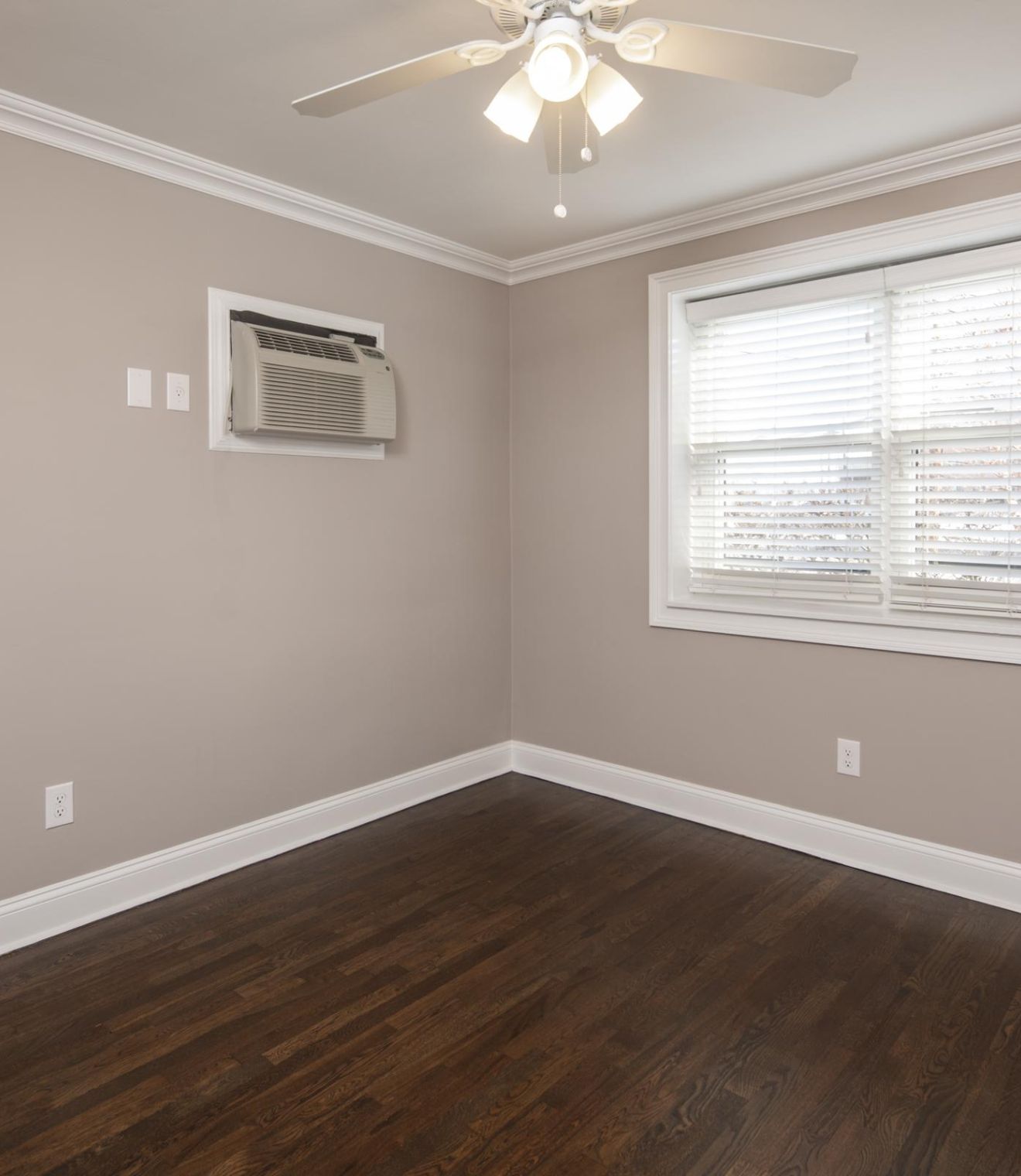 Uptown 550 Midrise spacious kitchen with custom cabinetry and stainless steel appliances