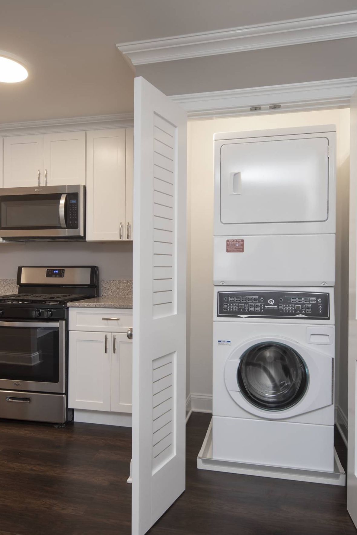 West Church Gardens Modern Minimal Apartment Kitchen with butcher block counters and industrial light fixtures