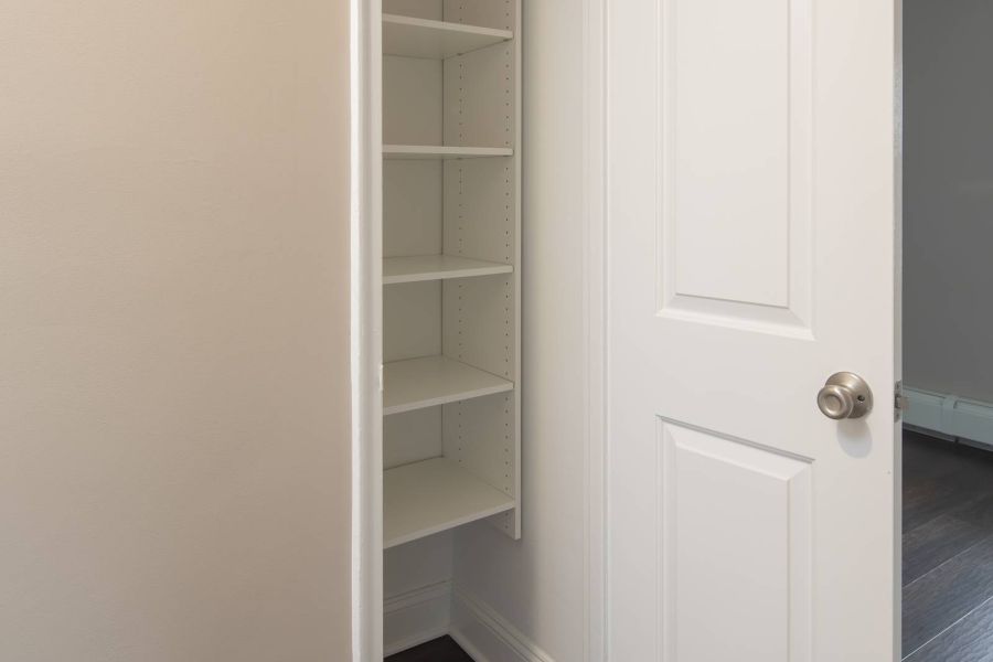 West Church Gardens Modern Spacious Living Room with mid-century furnishings and floor-to-ceiling windows