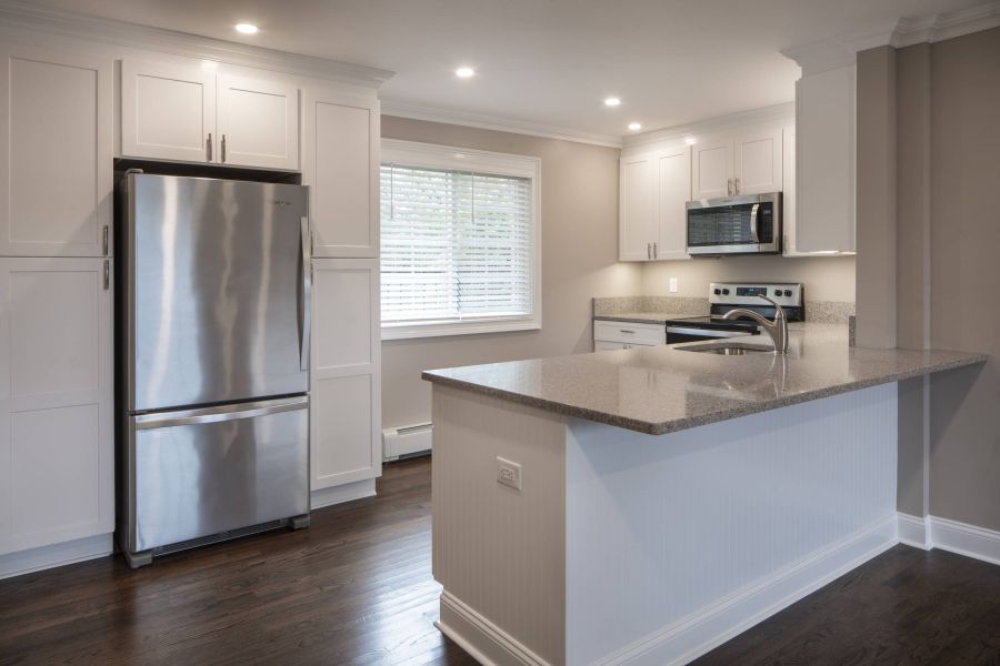 Westwood Manor Modern Minimal Bathroom with Tub and Sink