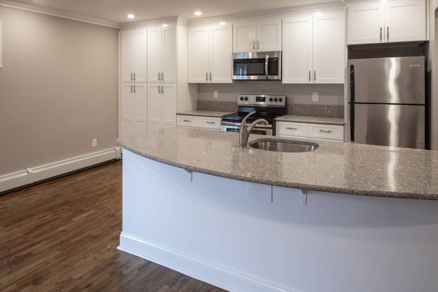 Westwood Manor Modern Minimal Bathroom with Tub and Sink