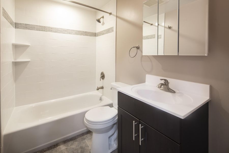 Woodland Hills Manor Modern Spacious Living Room with mid-century furnishings and floor-to-ceiling windows