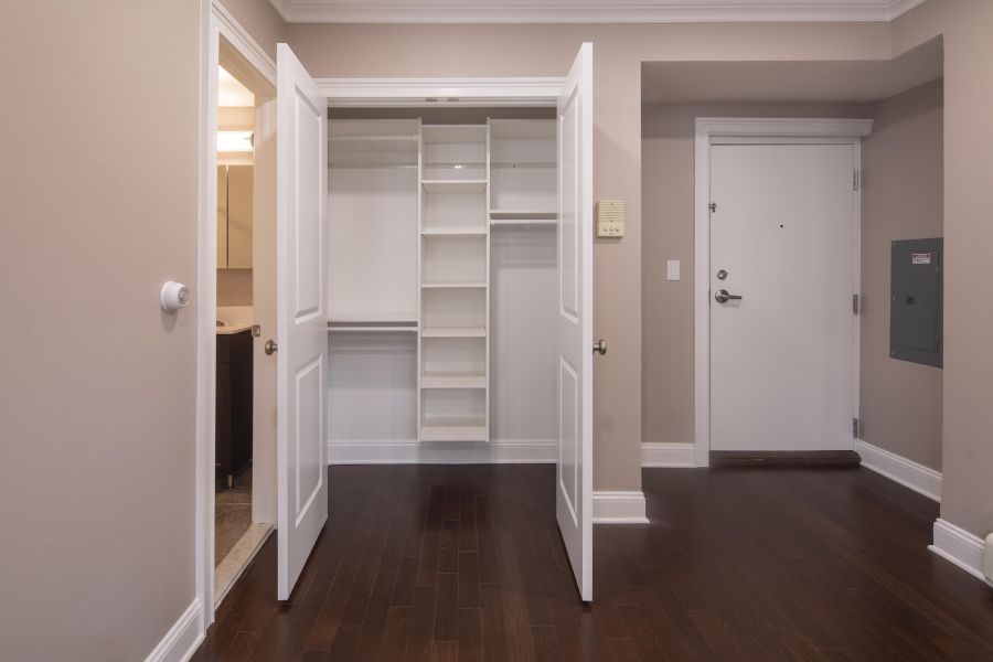 Woodland Hills Manor Modern Spacious Living Room with mid-century furnishings and floor-to-ceiling windows