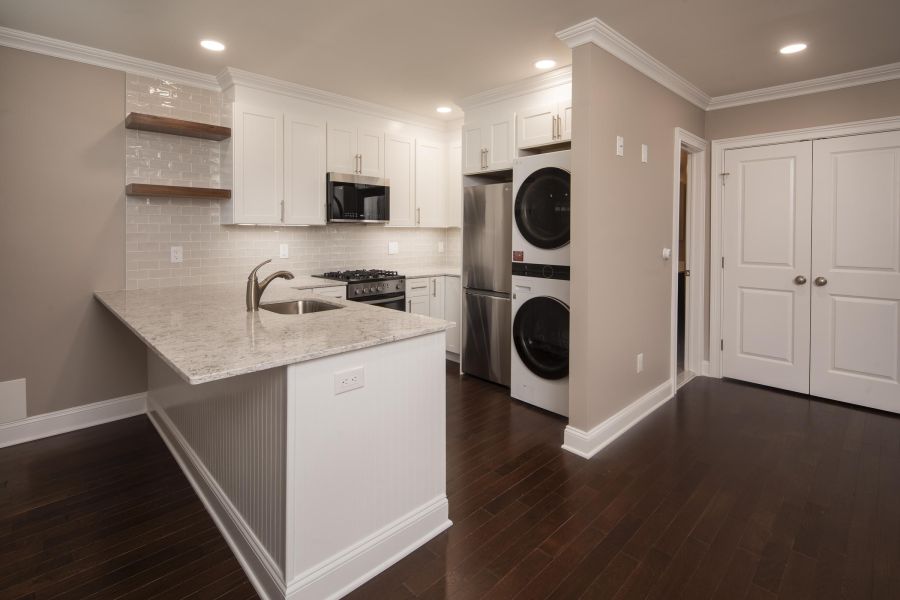 Woodland Hills Manor Modern Spacious Living Room with mid-century furnishings and floor-to-ceiling windows